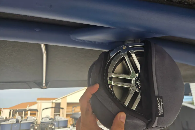 Slide: The Image of Speaker installation on 2018 Yamaha Boats 212 Limited S, featuring JL Audio cover. - 11