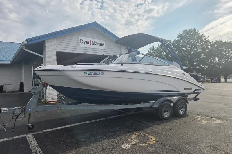 The Image of 2018 Yamaha Boats 212 Limited S on trailer at Dyer Marine dealership. - 0