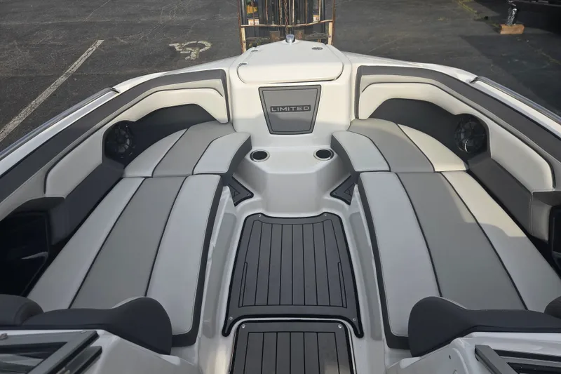 Slide: The Image of 2018 Yamaha Boats 212 Limited S interior with sleek seating and modern design. - 7