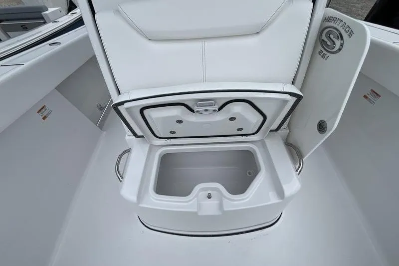 Slide: The Image of Open storage compartment on 2027 Sportsman Heritage 261 Center Console boat. - 10