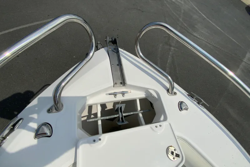 Slide: The Image of Bow view of 2016 Everglades 230 Center Console boat with anchor storage. - 23