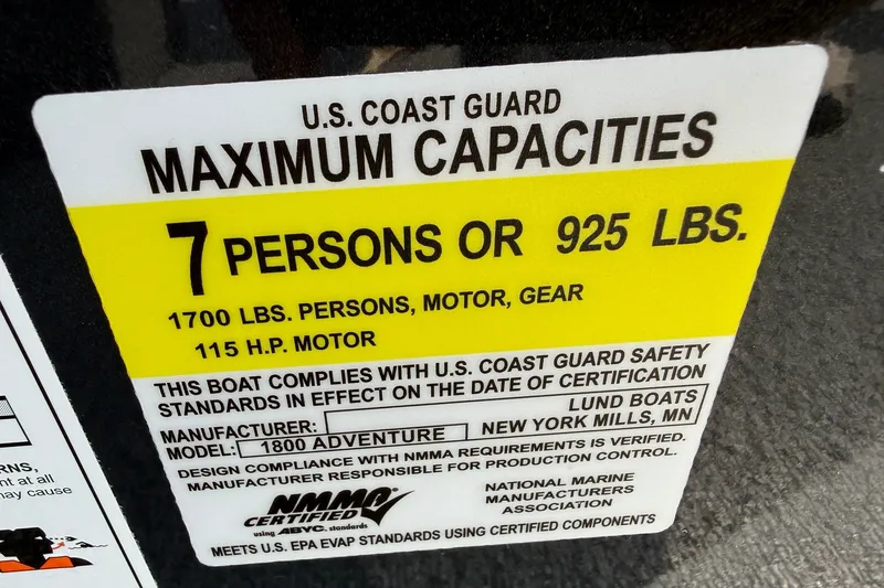 Slide: The Image of U.S. Coast Guard capacity label for Lund 1800 Adventure SS, 2027 model, 7 persons or 925 lbs. - 8