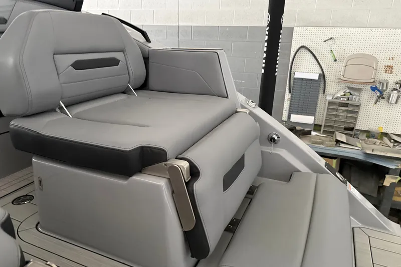 Slide: The Image of 2026 Yamaha Boats 295XD interior with sleek gray seating and modern design. - 4