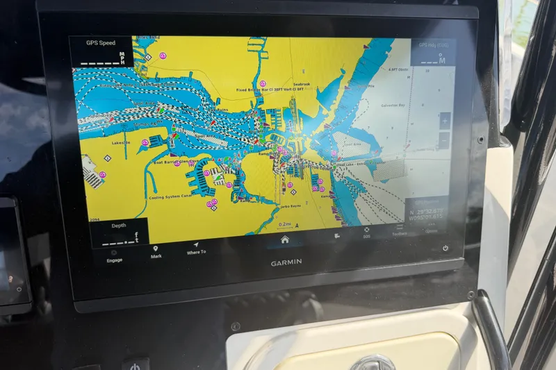Slide: The Image of Garmin GPS navigation screen on a 2009 Century 3200 Center Console boat. - 32