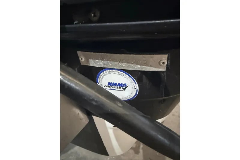 Slide: The Image of 2009 Century 3200 Center Console boat with NMMA certification label and identification plate. - 61