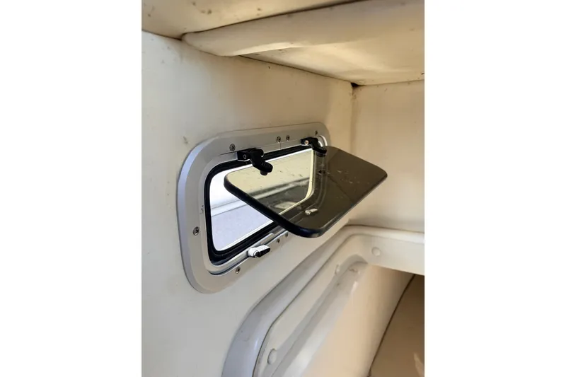 Slide: The Image of Open window on 2009 Century 3200 Center Console boat interior. - 48