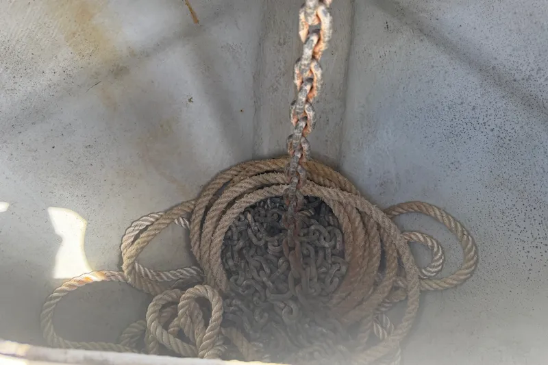 Slide: The Image of Rope and chain in a 2009 Century 3200 Center Console boat compartment. - 20