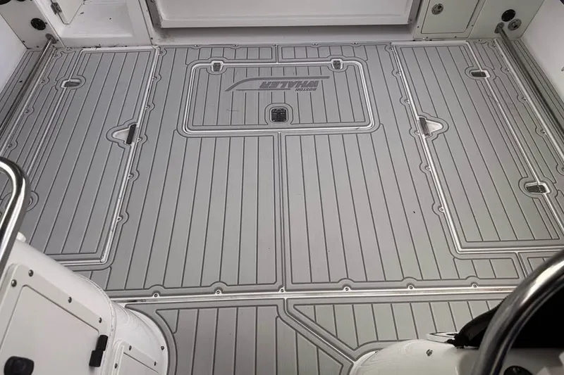 Slide: The Image of 2003 Boston Whaler 295 Conquest boat deck with custom non-slip flooring. - 7