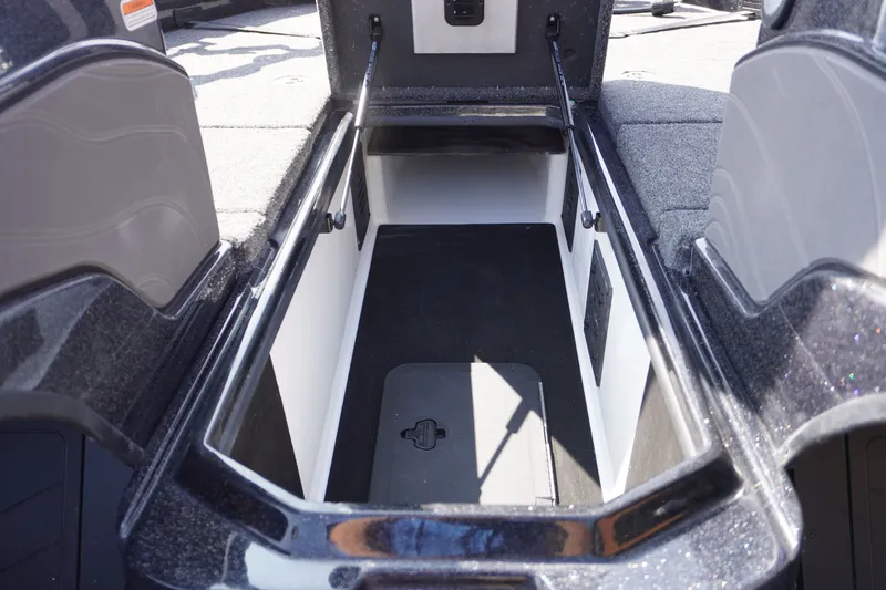 Slide: The Image of Open storage compartment in 2027 Nitro ZV21 Pro boat, showcasing spacious interior design. - 17
