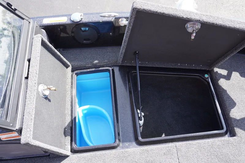Slide: The Image of Open storage compartments on a 2027 Nitro ZV21 Pro boat. - 19