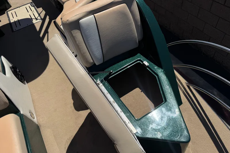 Slide: The Image of Boat interior with open storage compartment, Razor 258 pf, 2019 model. - 12