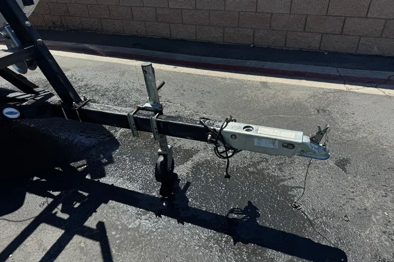 Slide: The Image of Trailer hitch of a 2019 Razor 258 pf on wet pavement. - 33