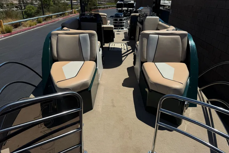 Slide: The Image of Pontoon boat interior with beige seating, Razor 258 pf model, 2019. - 11