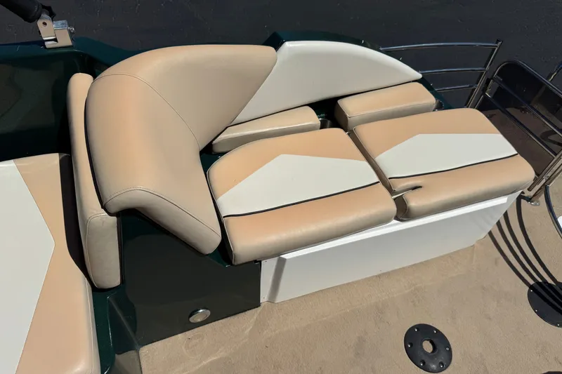Slide: The Image of Beige and white seating on a 2019 Razor 258 pf boat deck. - 25