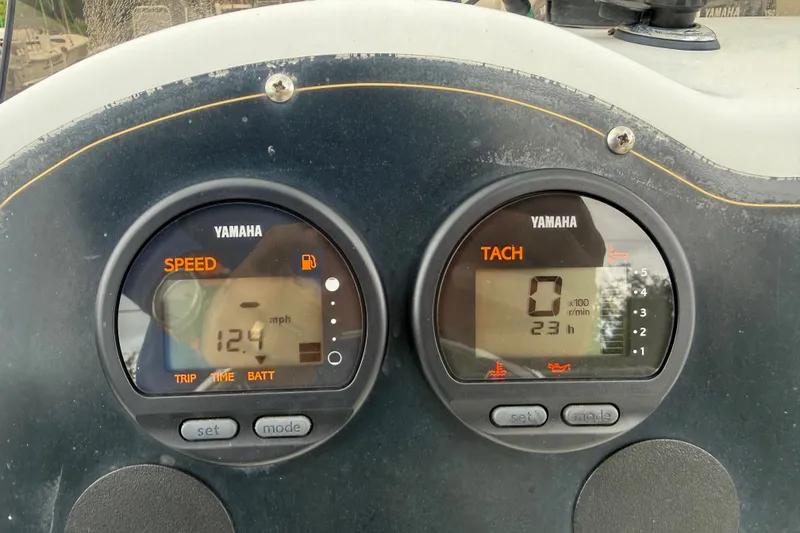 Slide: The Image of Yamaha speedometer and tachometer on a 2000 Polar 2100 Center Console boat. - 13