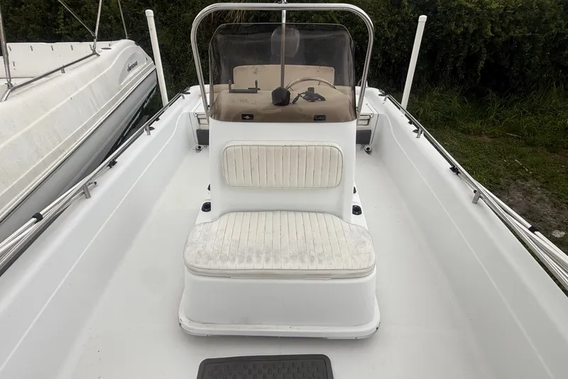 Slide: The Image of 2000 Polar 2100 Center Console boat with seating and steering console. - 18