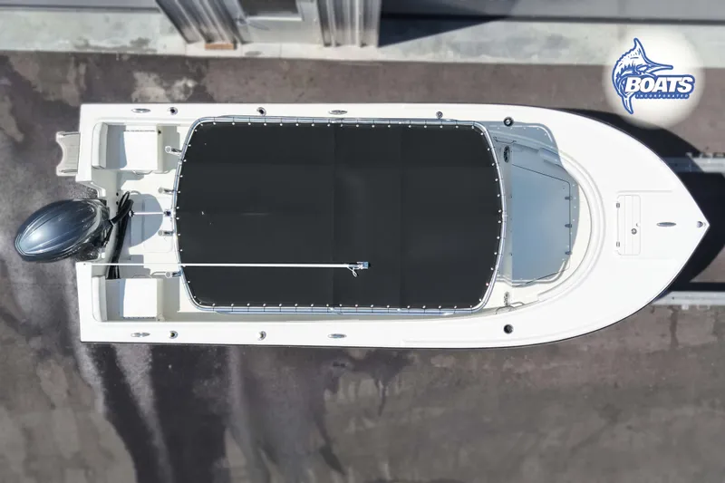 Slide: The Image of Top view of 2024 Parker 2100 Special Edition boat with outboard motor. - 13