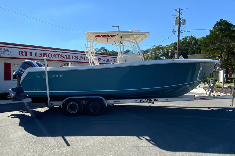 The Image of 2014 Sailfish 290 CC boat on trailer at RT113 Boat Sales. - 1