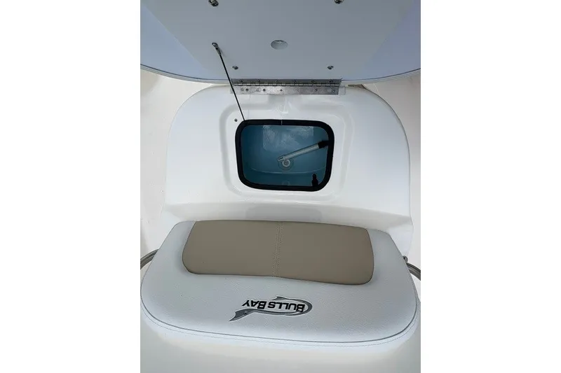 Slide: The Image of Bulls Bay 2000 boat interior with cushioned seating, 2026 model. - 12