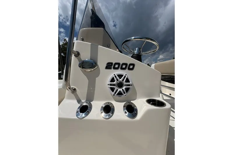 Slide: The Image of Bulls Bay 2000 boat console with steering wheel and speaker, 2026 model. - 10