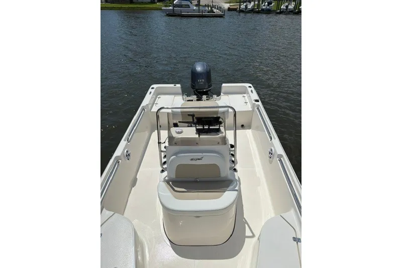 Slide: The Image of 2026 Bulls Bay 2000 boat with outboard motor on calm water. - 13