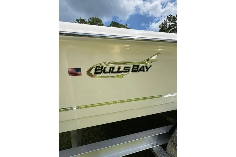 Slide: The Image of 2026 Bulls Bay 2000 boat logo with American flag decal. - 5
