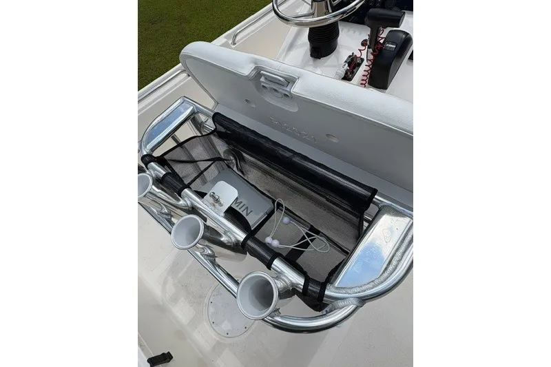 Slide: The Image of Bulls Bay 2000 boat console with rod holders and Garmin device, 2026 model. - 14