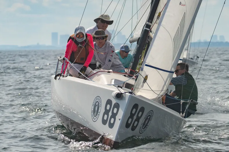 Slide: The Image of Sailing team on 2013 J Boats J/70 yacht racing on open water. - 16
