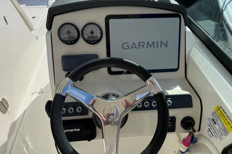 Slide: The Image of Steering console of 2018 Boston Whaler 230 Vantage with Garmin display. - 5