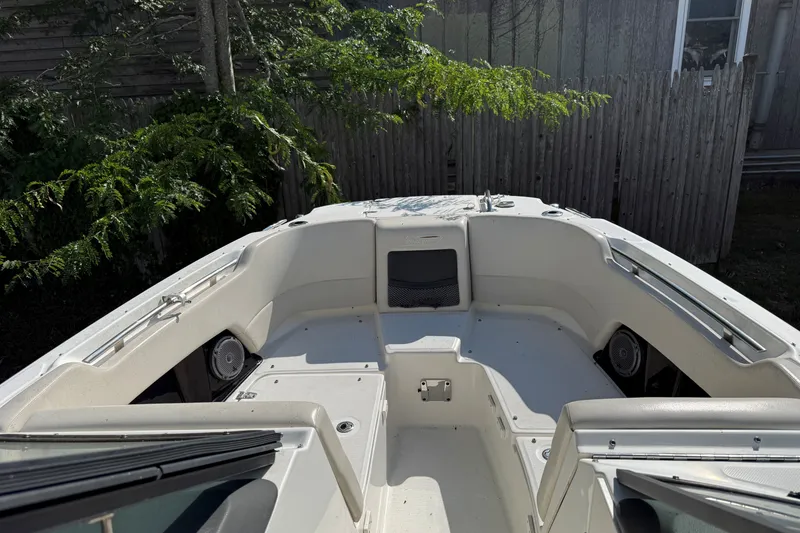 Slide: The Image of 2018 Boston Whaler 230 Vantage boat interior with seating and speakers. - 4