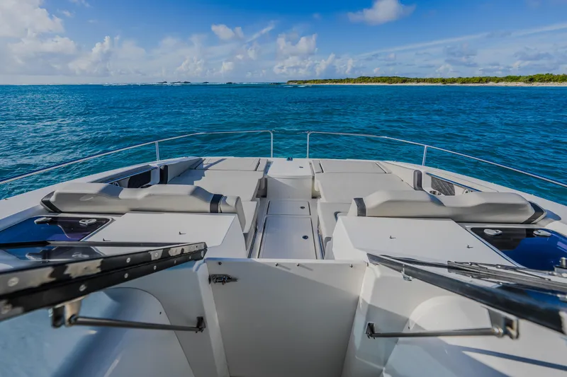 Slide: The Image of 2023 Aquila 36 Sport yacht deck with ocean view and clear skies. - 29