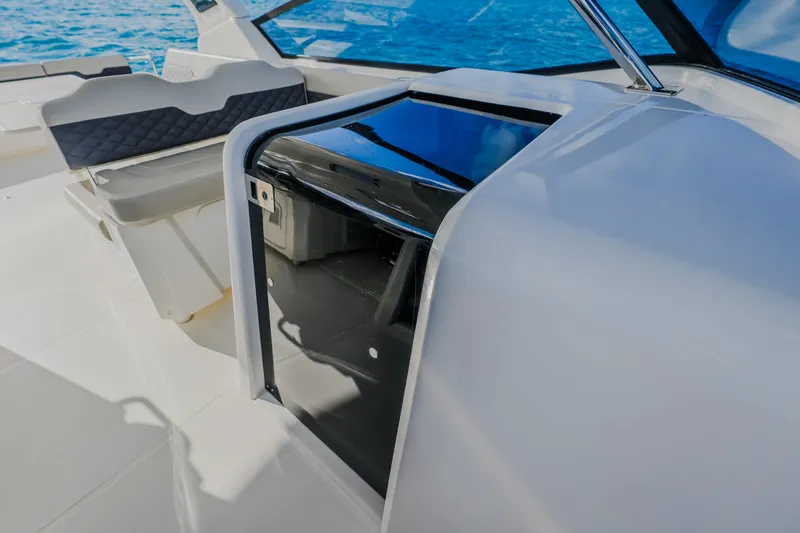 Slide: The Image of 2023 Aquila 36 Sport boat interior with sleek seating and modern design. - 32