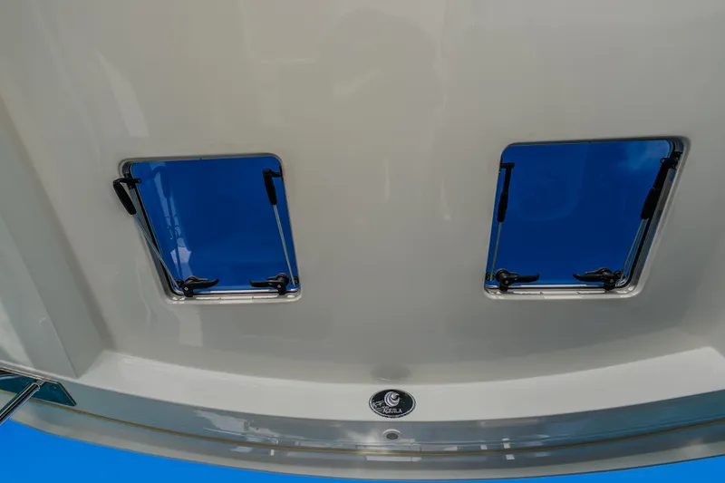 Slide: The Image of Aquila 36 Sport 2023 boat with dual blue hatches on the deck. - 20