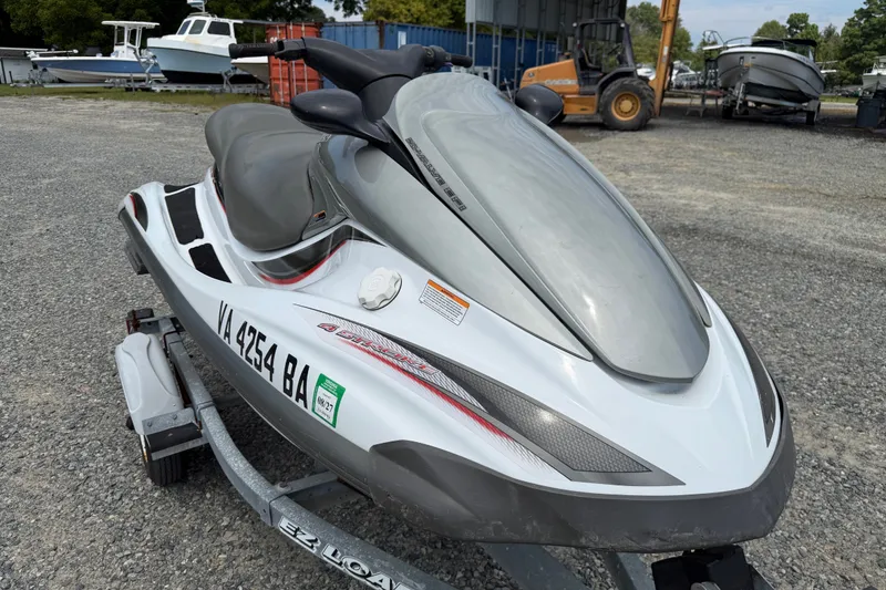 Slide: The Image of 2002 Yamaha WaveRunner FX jet ski on trailer in outdoor setting. - 14