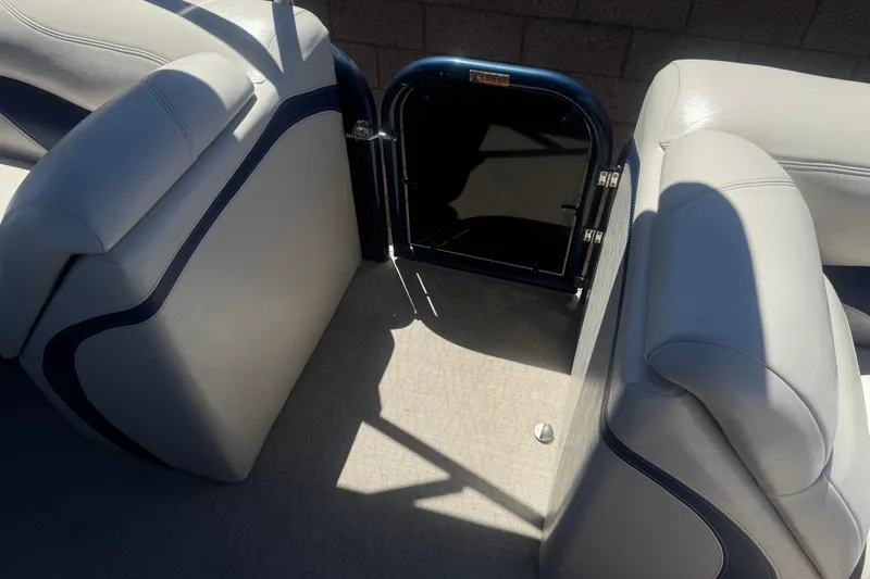Slide: The Image of Interior of a 2020 Aloha Pontoon Tropical TS 220 with open gate and seating. - 14