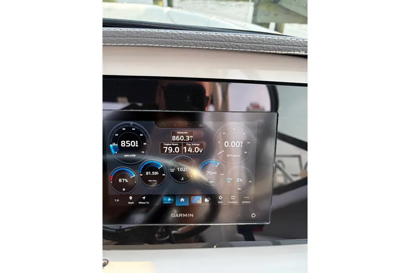 Slide: The Image of Dashboard display of a 2023 Regal LX2 boat showing engine metrics and GPS data. - 9