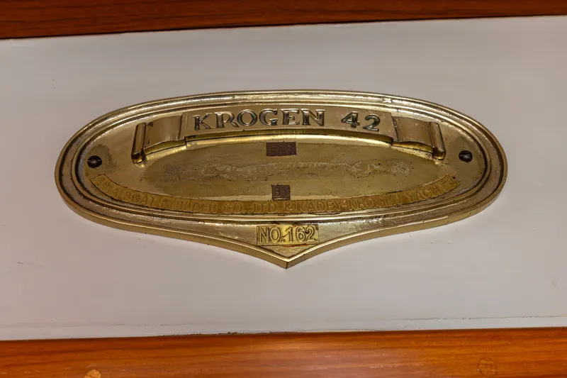 Slide: The Image of Brass nameplate of 1990 Kadey-Krogen 42 yacht, model number 162. - 27