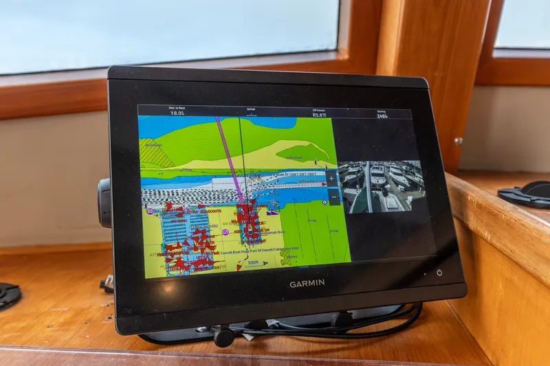 Slide: The Image of Garmin navigation display on 1990 Kadey-Krogen 42 boat, showing detailed marine charts. - 28