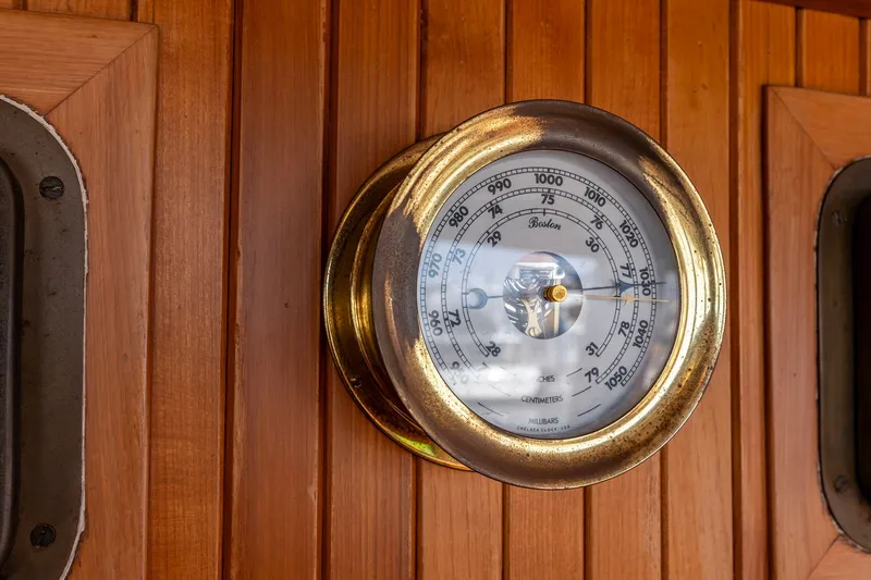 Slide: The Image of Barometer on 1990 Kadey-Krogen 42 yacht, mounted on wooden paneling. - 33