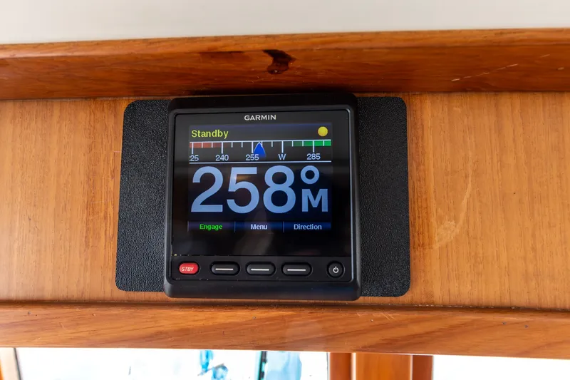 Slide: The Image of Garmin navigation display on 1990 Kadey-Krogen 42, showing heading 258 degrees. - 41