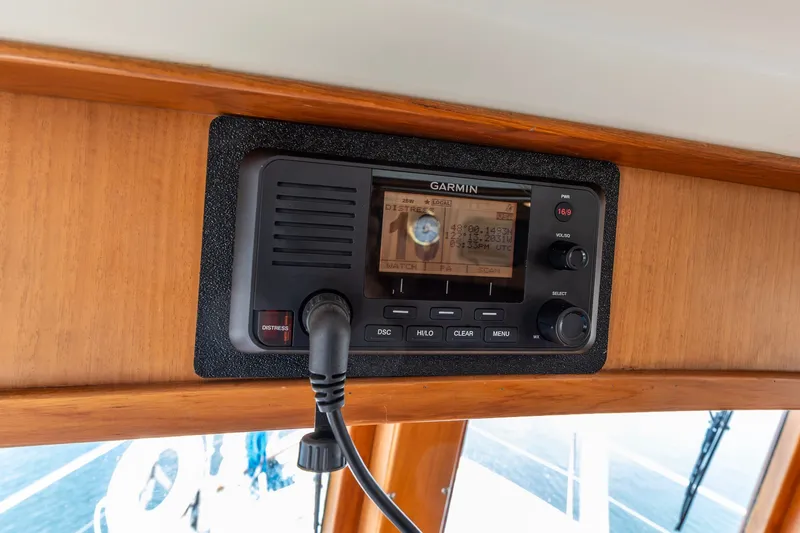 Slide: The Image of Garmin marine radio on 1990 Kadey-Krogen 42 boat dashboard. - 40