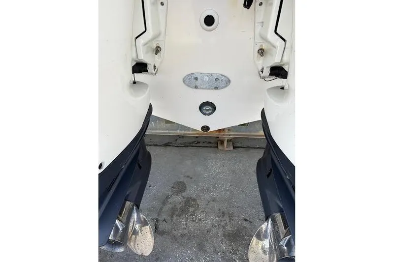 Slide: The Image of 2022 Pursuit S 268 Sport boat stern with dual propellers. - 22