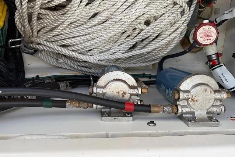 Slide: The Image of Coiled rope and mechanical components on a 2022 Pursuit S 268 Sport boat. - 21