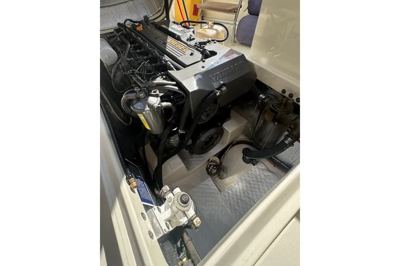 Slide: The Image of Engine compartment of a 2005 Hinckley Picnic Boat 36 EP, featuring a Yanmar engine. - 30
