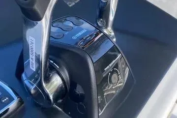 Slide: The Image of Close-up of Yamaha throttle controls on a 2008 Contender 38 Express boat. - 51