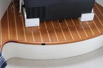 Slide: The Image of 2008 Contender 38 Express boat interior with wooden flooring and equipment. - 42