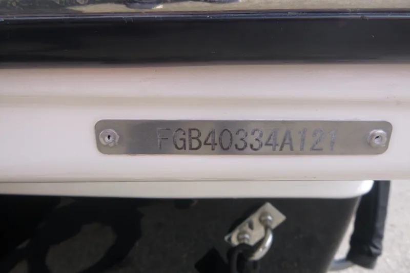 Slide: The Image of 2021 Chaparral 23 SSi boat identification plate with serial number FGB40334A121. - 17