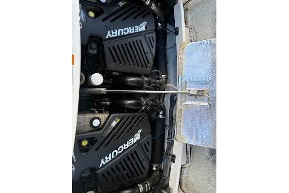 Slide: The Image of Engine compartment of a 2006 Chris Craft Corsair Heritage with dual Mercury engines. - 35
