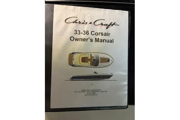 Slide: The Image of Owner's manual for 2006 Chris Craft Corsair Heritage boat, model 33-36, with top and side views. - 44
