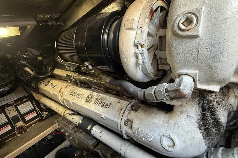 Slide: The Image of Engine room of a 1991 Sea Ray 630 Super Sun Sport with Detroit Diesel engine. - 55
